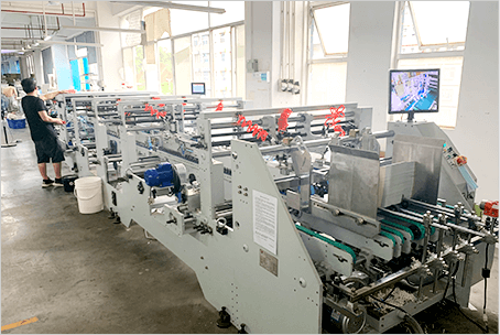 Automatic box gluing machine